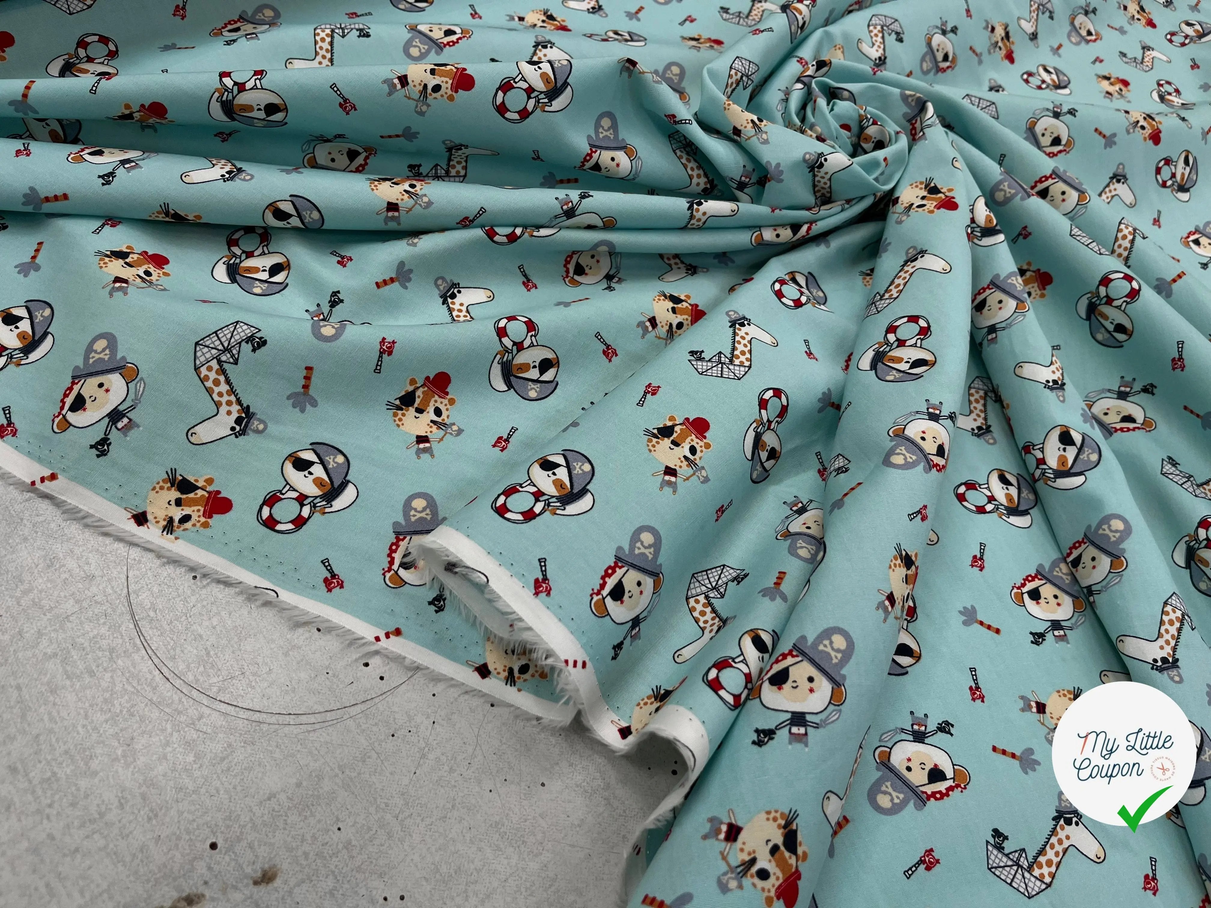 POPELINE DE COTON IMPRIMÉE LITTLE ONES PIRATES KID BLEU CIEL - My Little Coupon