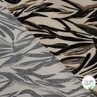 Sergé de viscose EcoVero feuilles pinceau sable - détail du motif