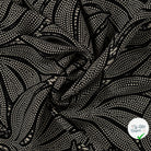 Sergé de viscose EcoVero feuilles serpent sable - drapé