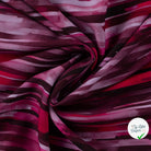 Sergé de viscose EcoVero rayures pinceau cyclamen - drapé