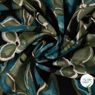 Sergé de viscose imprimé feuilles turquoise - drapé