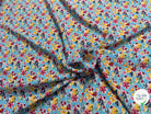 TISSU 100% VISCOSE FOND BLEU CIEL IMPRIMÉ BOUQUETS - My Little Coupon