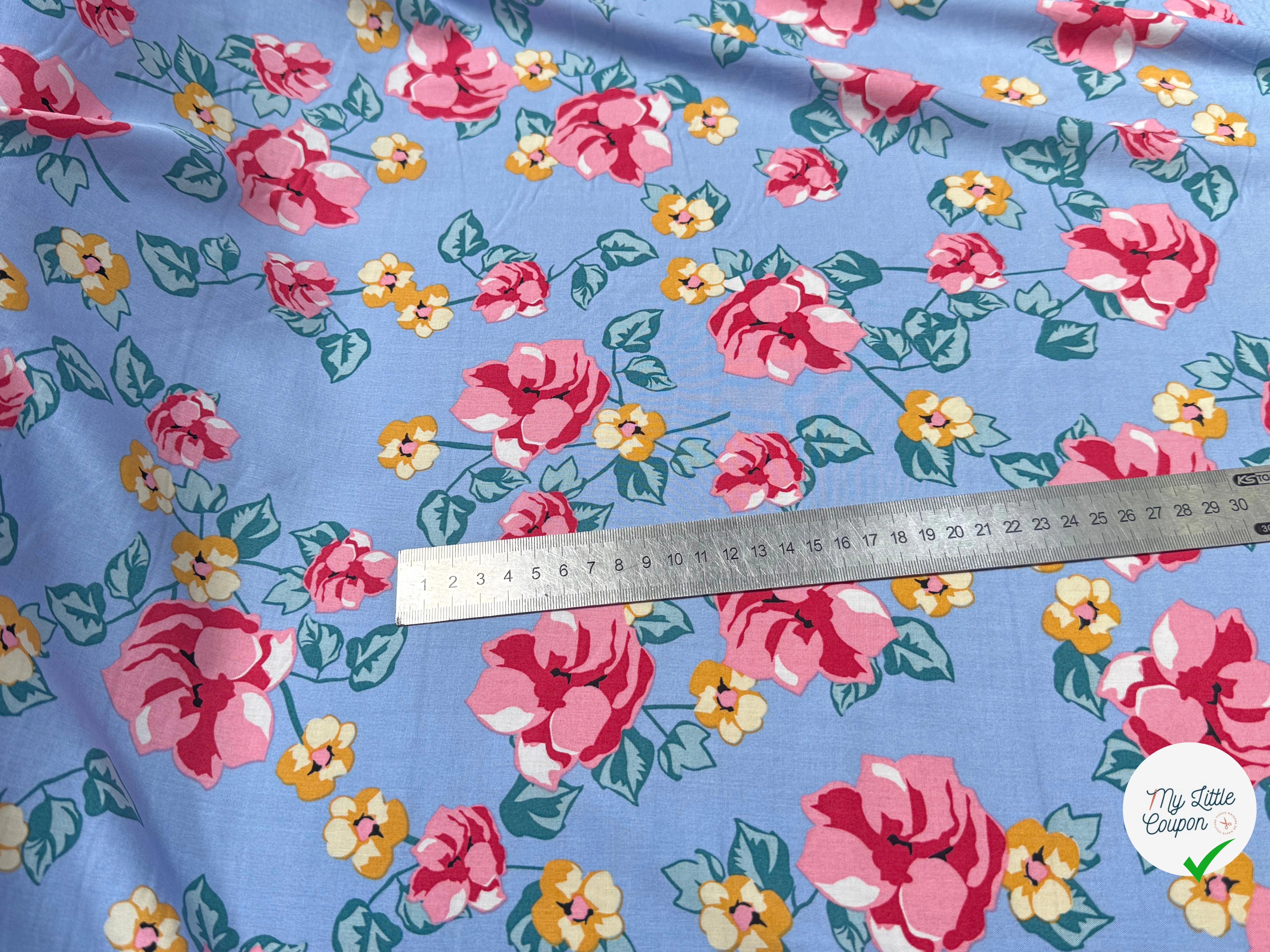 TISSU 100% VISCOSE IMPRIMÉ BRANCHES À FLEURS FOND BLEU CIEL - My Little Coupon