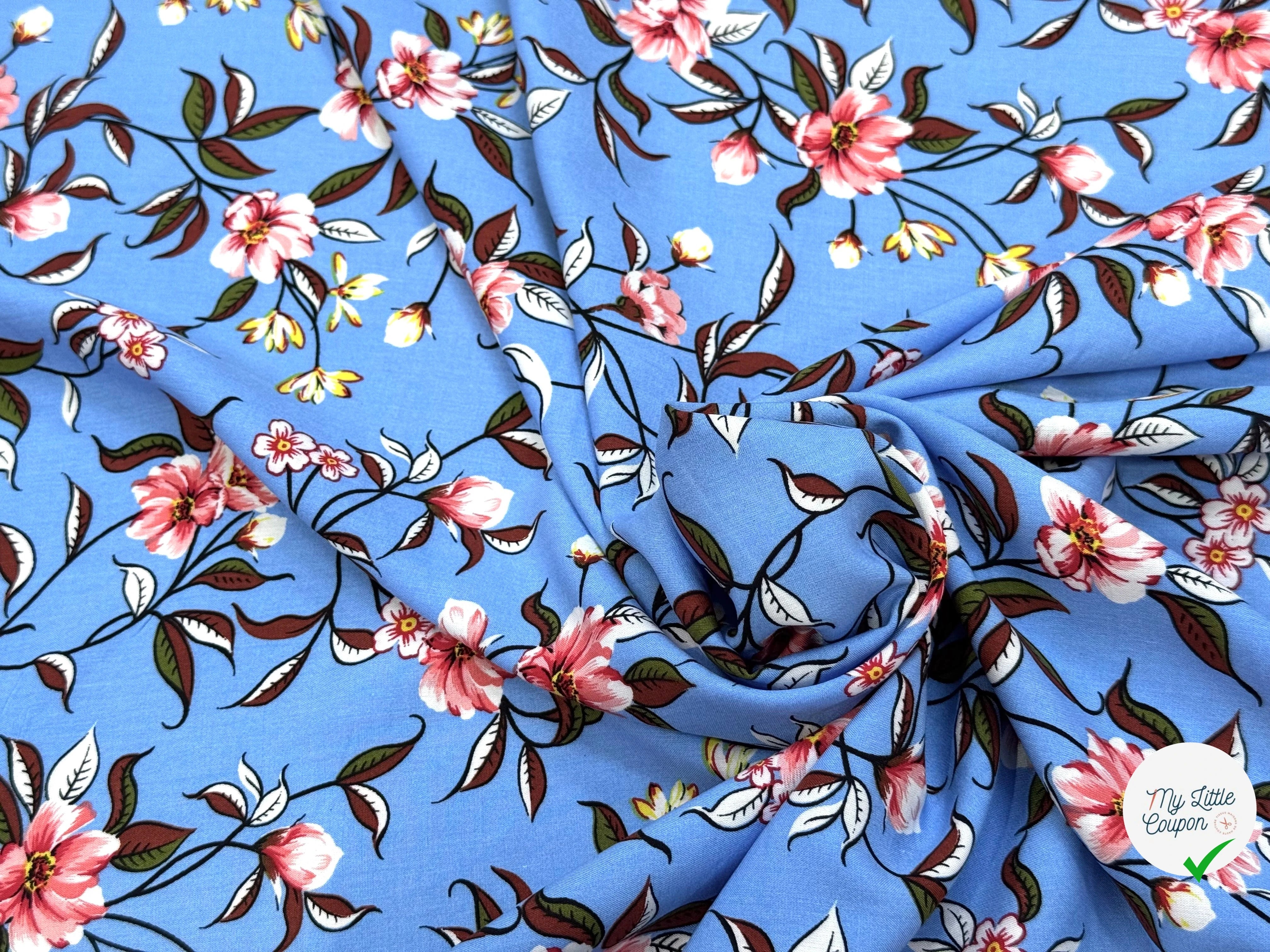 TISSU 100% VISCOSE IMPRIMÉ FOND BLEU CIEL - My Little Coupon