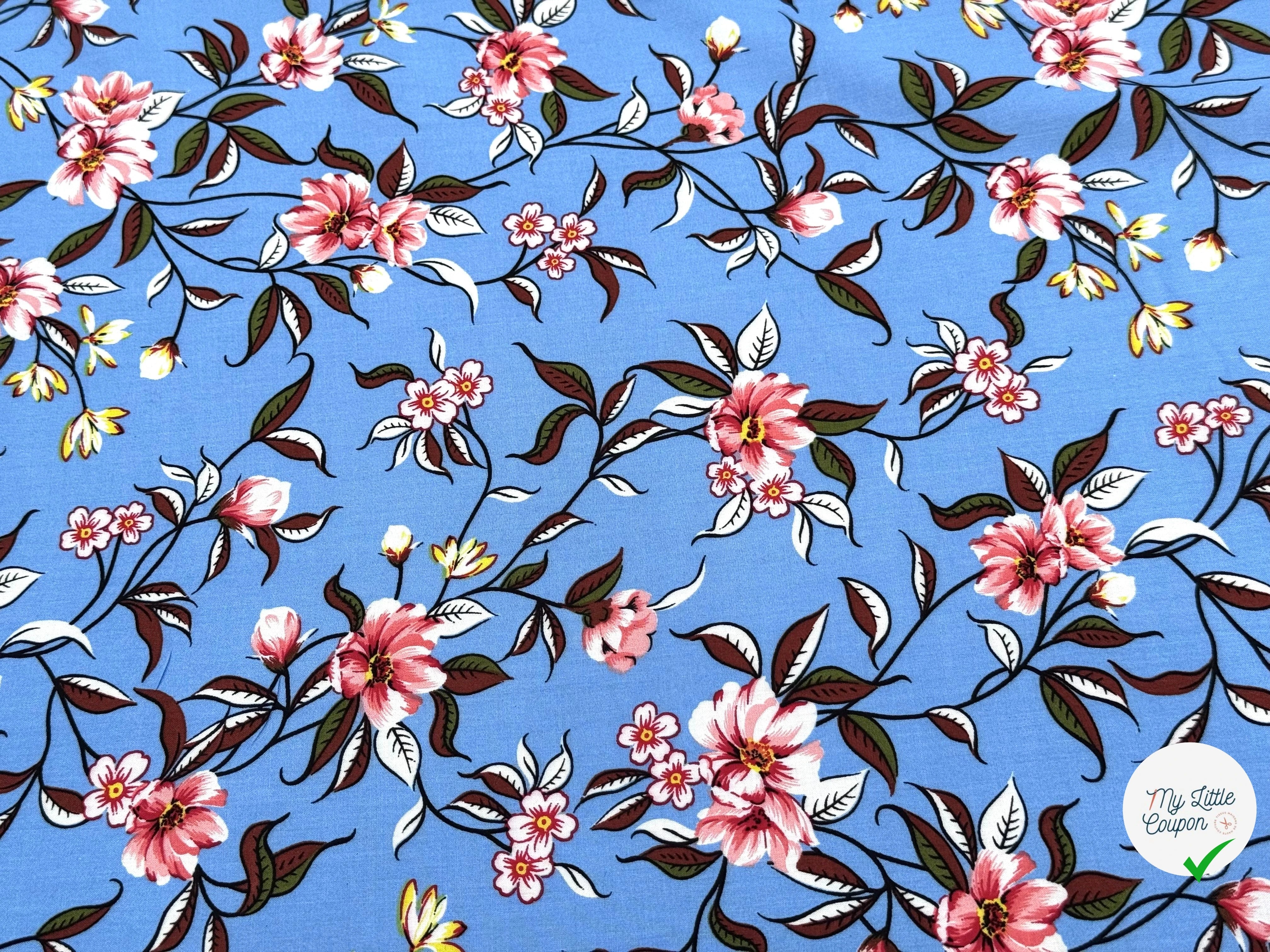 TISSU 100% VISCOSE IMPRIMÉ FOND BLEU CIEL - My Little Coupon