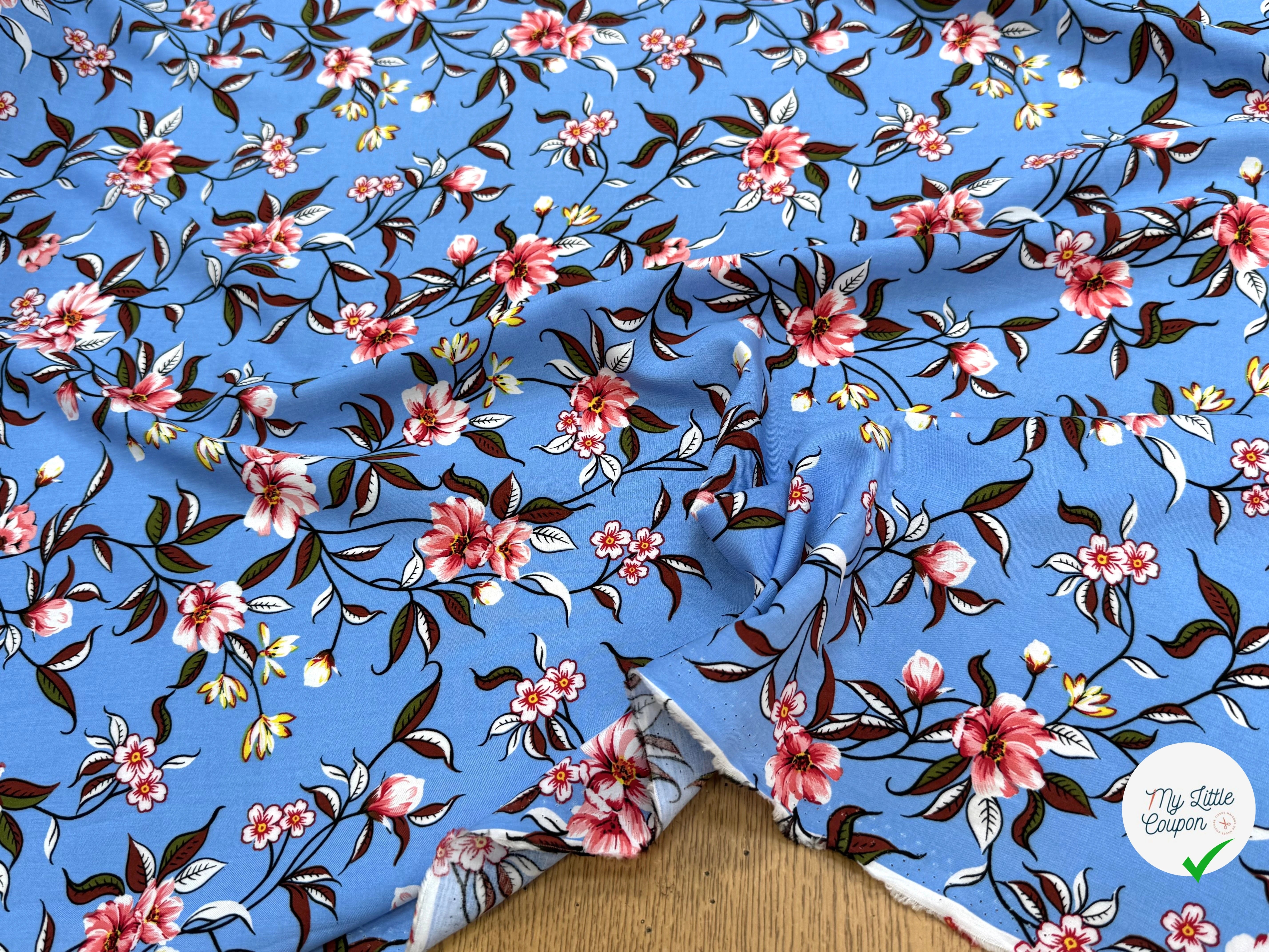 TISSU 100% VISCOSE IMPRIMÉ FOND BLEU CIEL - My Little Coupon