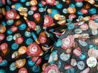 TISSU 100% VISCOSE IMPRIMÉ FOND NOIR MOTIFS CIRCULAIRES - My Little Coupon