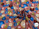 TISSU 100% VISCOSE IMPRIMÉ FOND VIEUX ROSE MOTIFS CIRCULAIRES - My Little Coupon