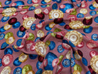 TISSU 100% VISCOSE IMPRIMÉ FOND VIEUX ROSE MOTIFS CIRCULAIRES - My Little Coupon