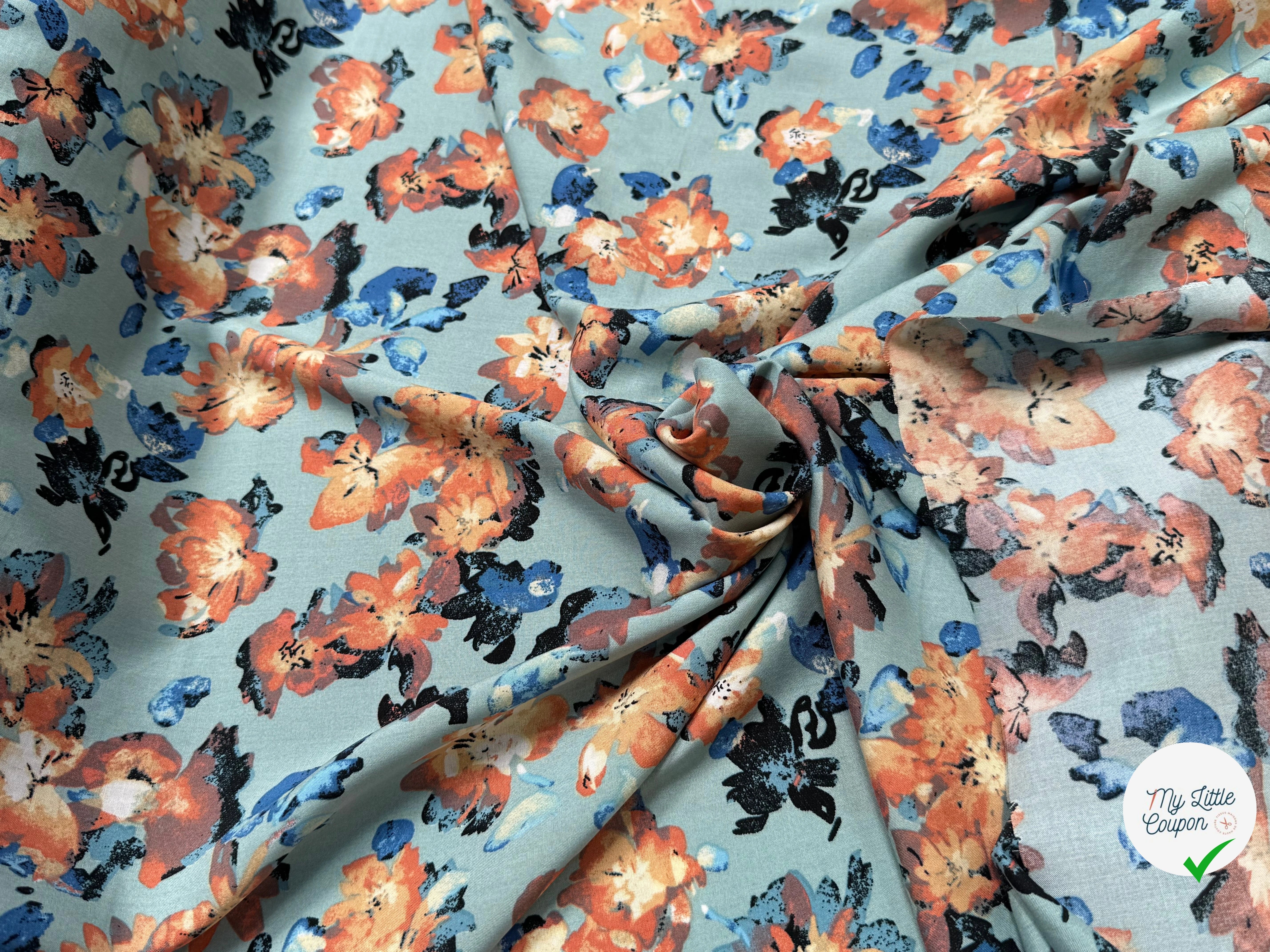 TISSU 100% VISCOSE IMPRIMÉ GROSSES BASES DE FLEURS FOND VERT D'EAU - My Little Coupon