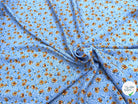 TISSU 100% VISCOSE IMPRIMÉ MINI FLEURS FOND BLEU CIEL - My Little Coupon