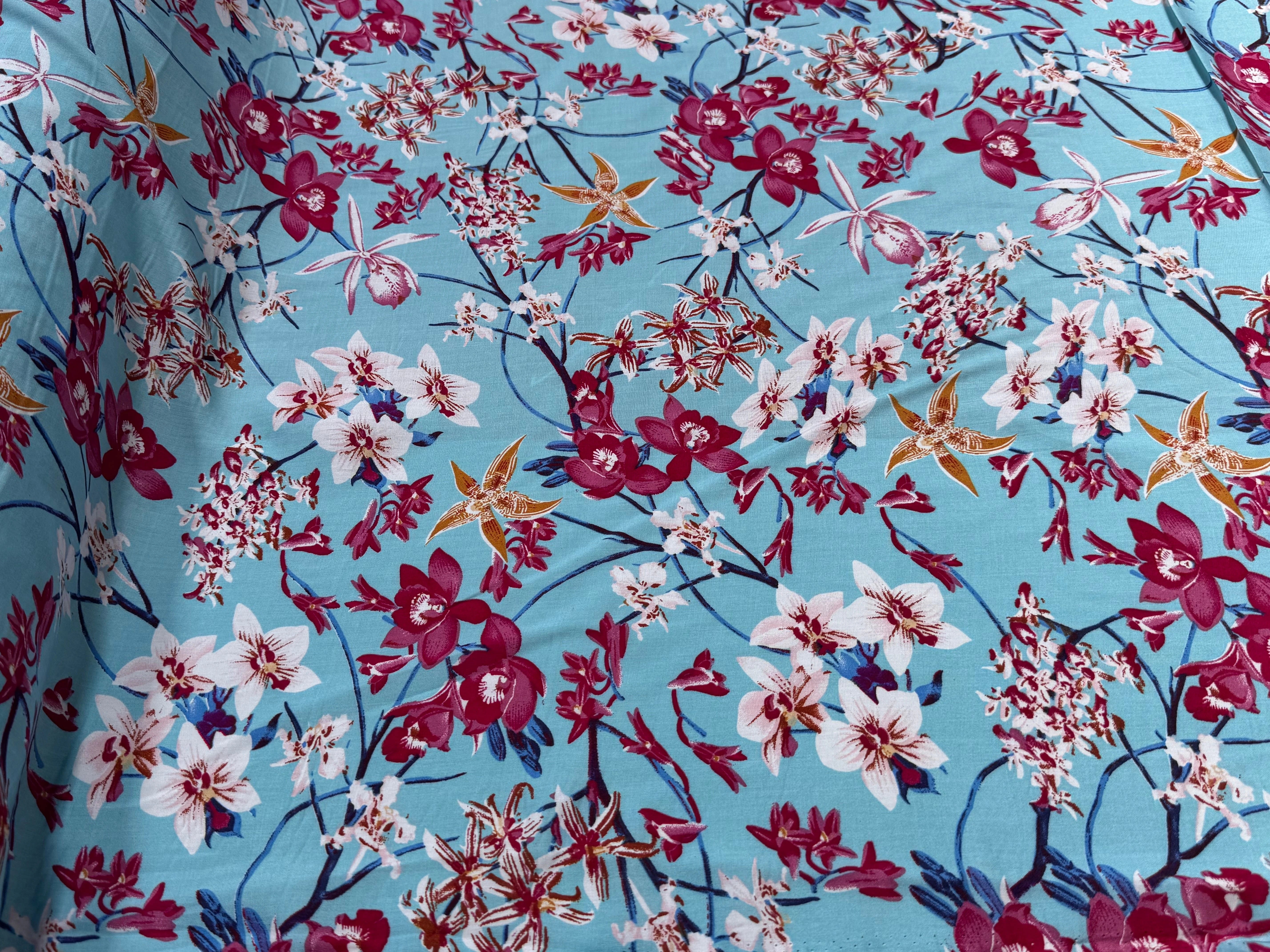 TISSU 100% VISCOSE IMPRIMÉ MOTIFS FLOREAUX FOND TURQUOISE - My Little Coupon