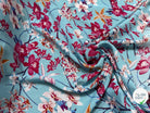 TISSU 100% VISCOSE IMPRIMÉ MOTIFS FLOREAUX FOND TURQUOISE - My Little Coupon