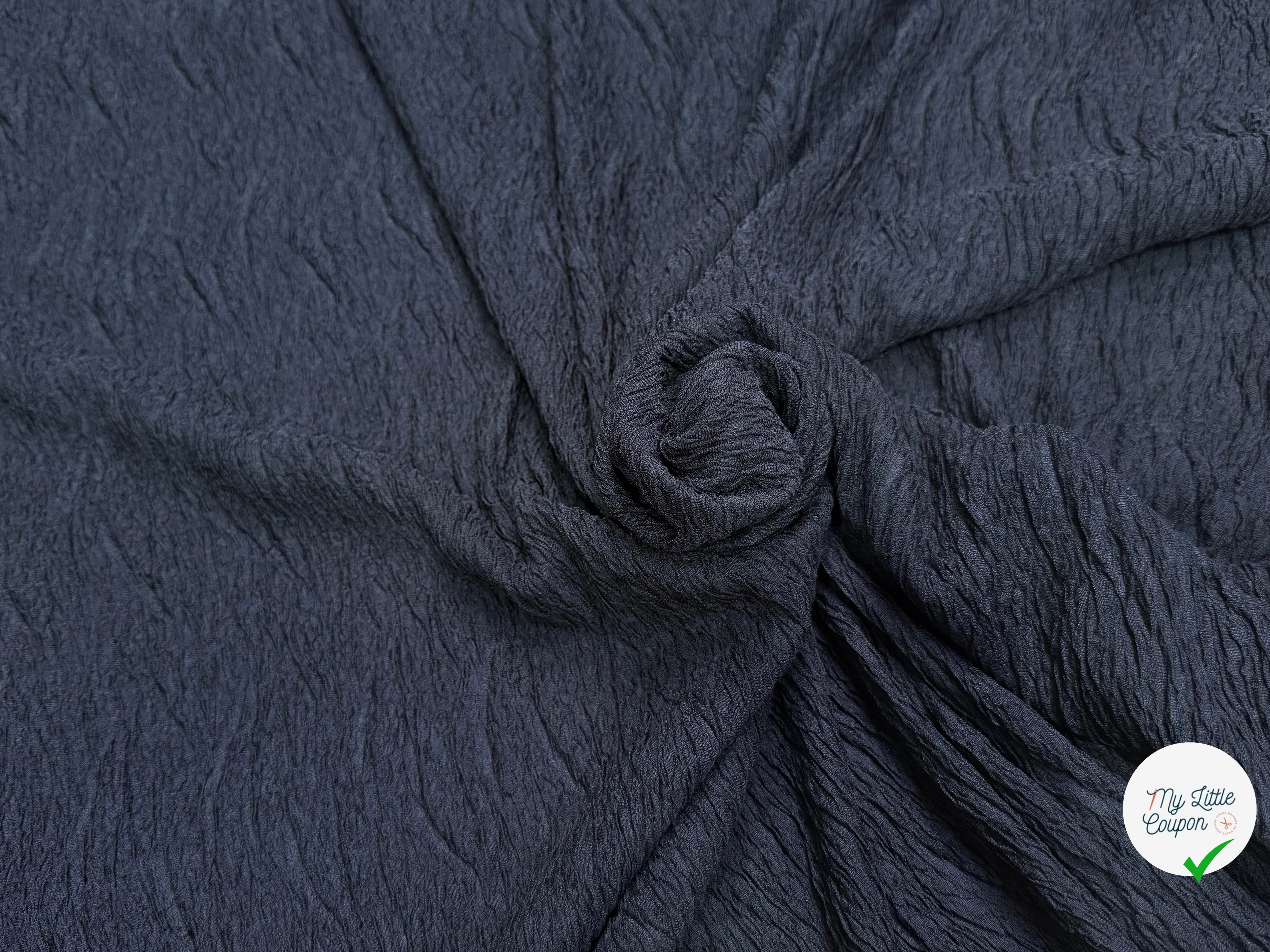 Tissu fluide cloqué stretch noir