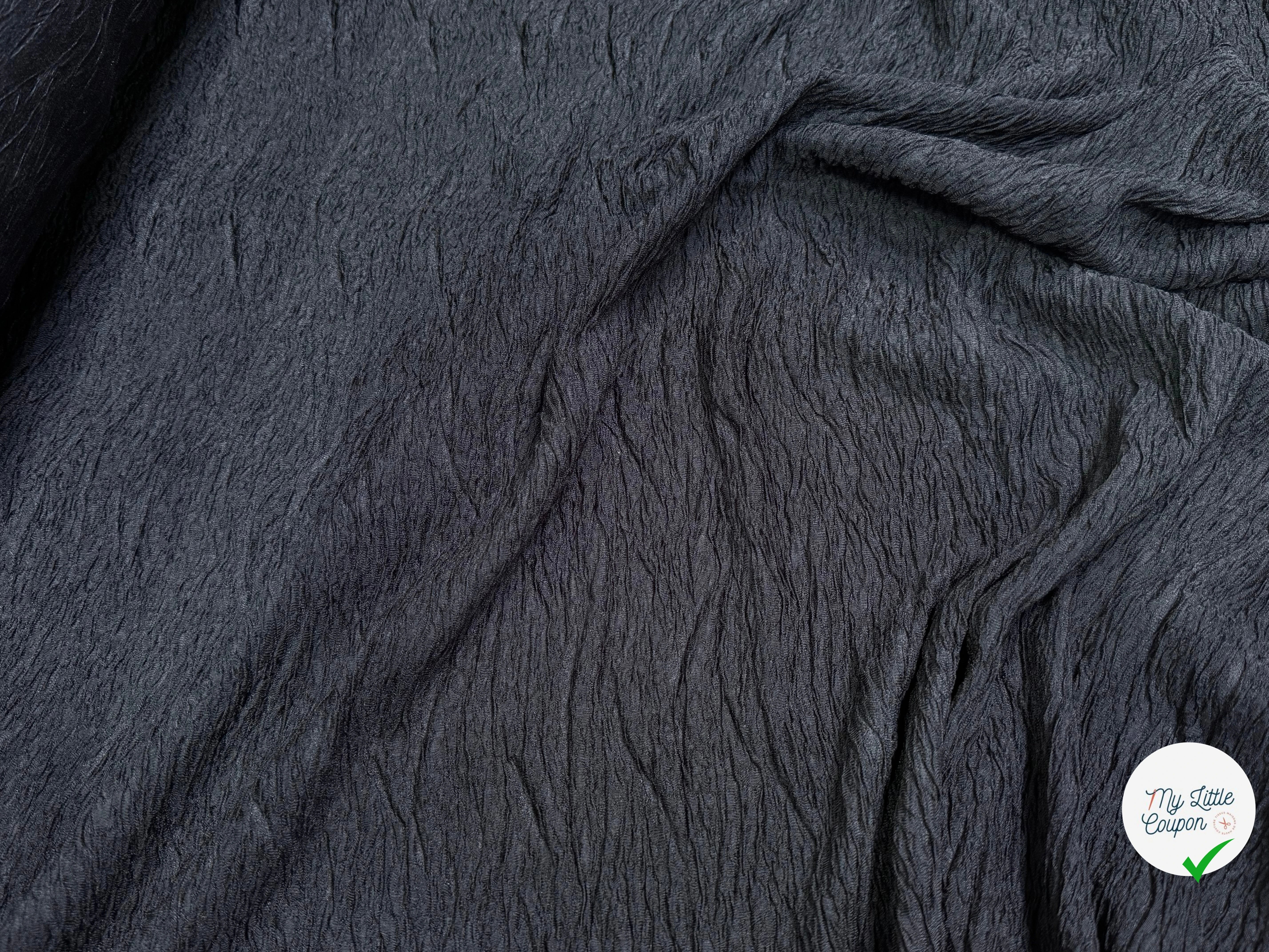 Tissu fluide cloqué stretch noir - détail du tissu