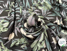 VISCOSE DOUCE FOND NOIR MOTIFS FLEURS VERT ET BLANC ECOVERO - My Little Coupon