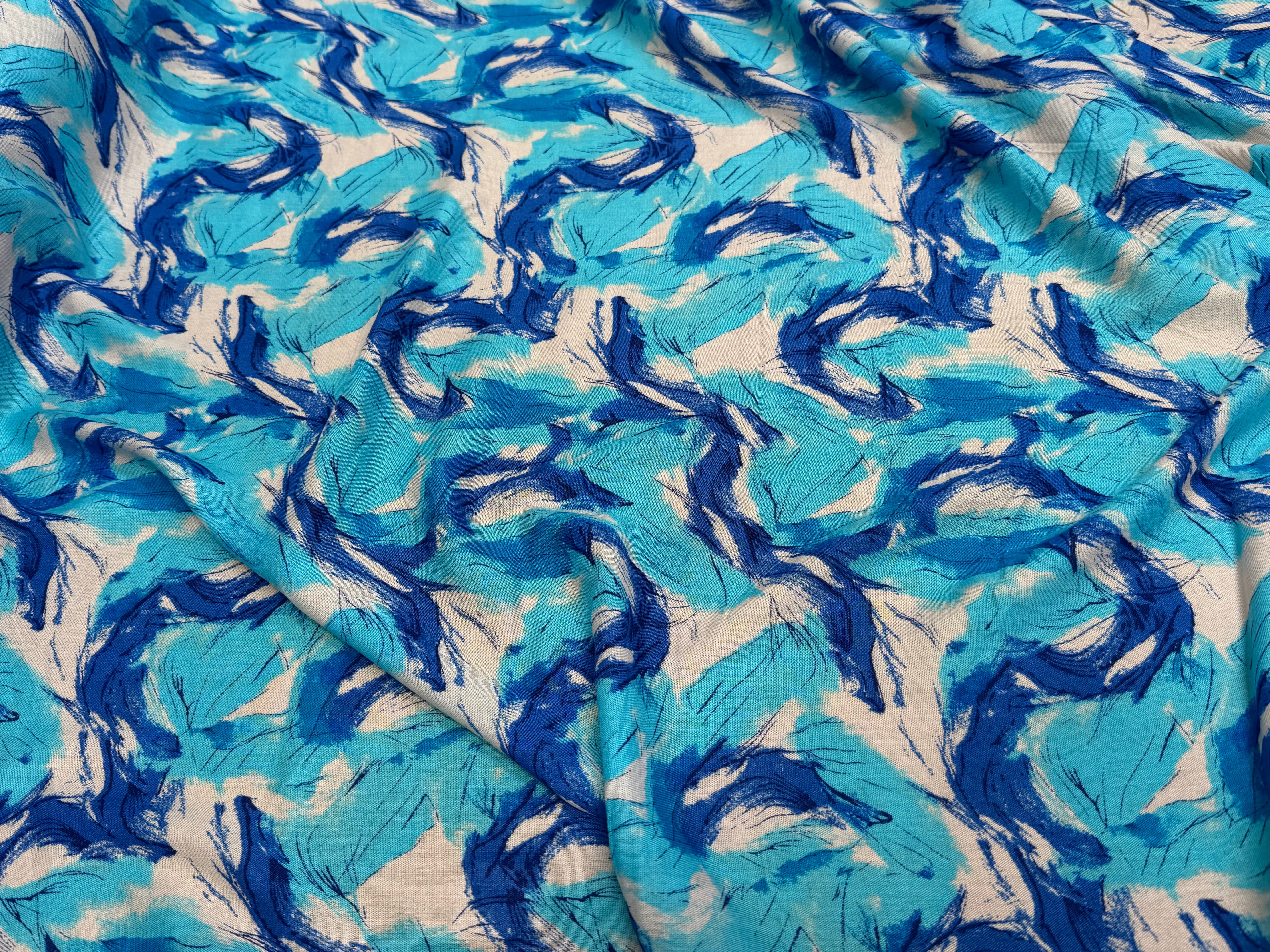 VISCOSE FLUIDE FOND BLANC IMPRIMÉE TOURBILLON ROI TURQUOISE - My Little Coupon