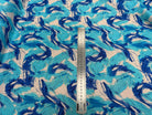 VISCOSE FLUIDE FOND BLANC IMPRIMÉE TOURBILLON ROI TURQUOISE - My Little Coupon