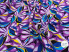 VISCOSE FLUIDE FOND VIOLET MOTIFS FEUILLAGES BLEU NOIR - My Little Coupon