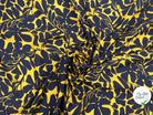 VISCOSE IMPRIMÉE FLEURS NOIRES FOND OCRE MSO