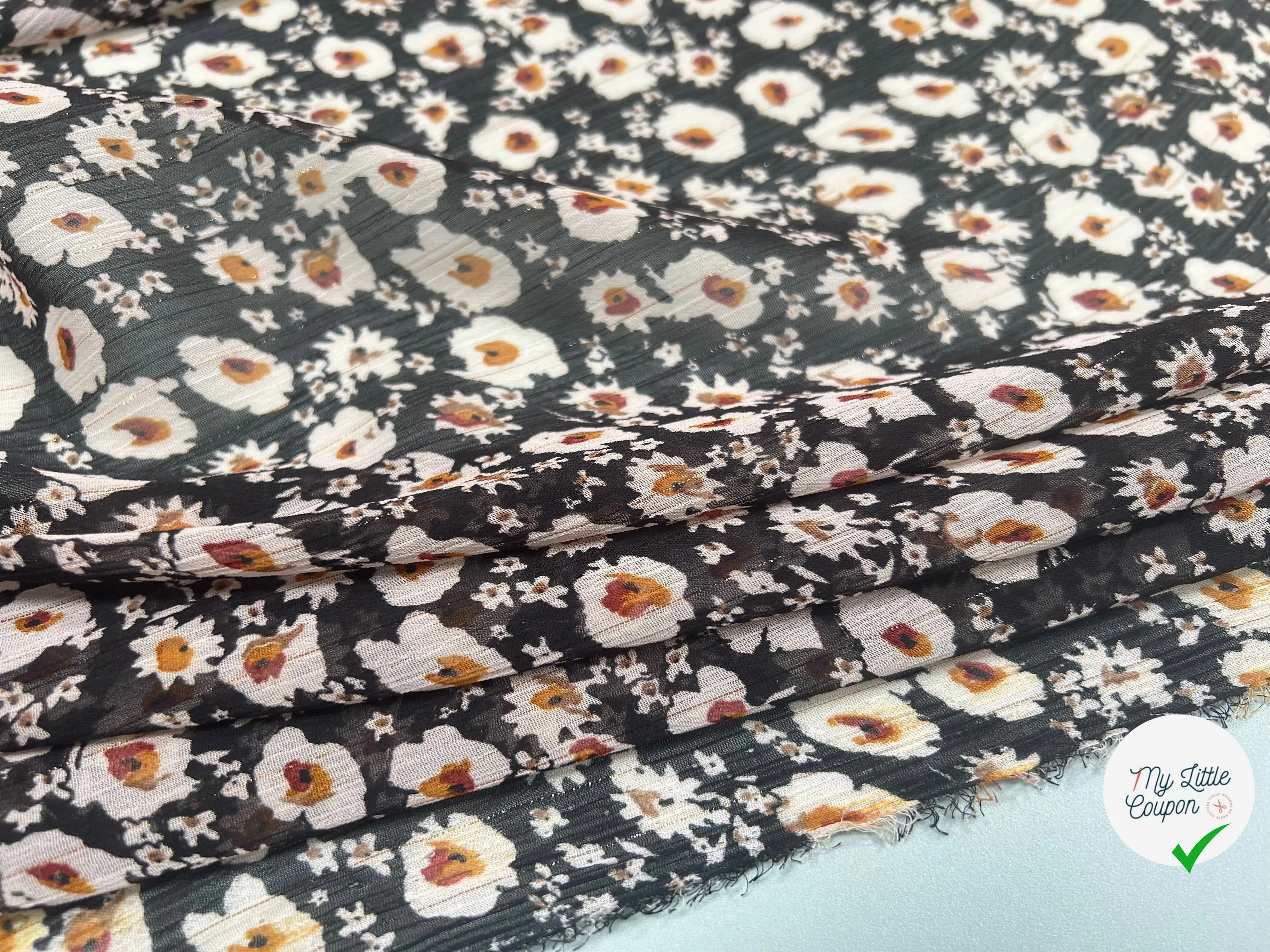 VOILE LUREX TESSUTO 100%PL FOND NOIR PETITES FLEURS BLANC - My Little Coupon