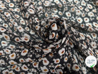 VOILE LUREX TESSUTO 100%PL FOND NOIR PETITES FLEURS BLANC - My Little Coupon