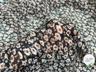 VOILE LUREX TESSUTO 100%PL FOND NOIR PETITES FLEURS BLANC - My Little Coupon