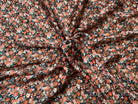 YORYU SATIN STRIPE IMPRIMÉ FLEURS ORANGÉS FOND NOIR FINES RAYURES LUREX DORÉ - My Little Coupon
