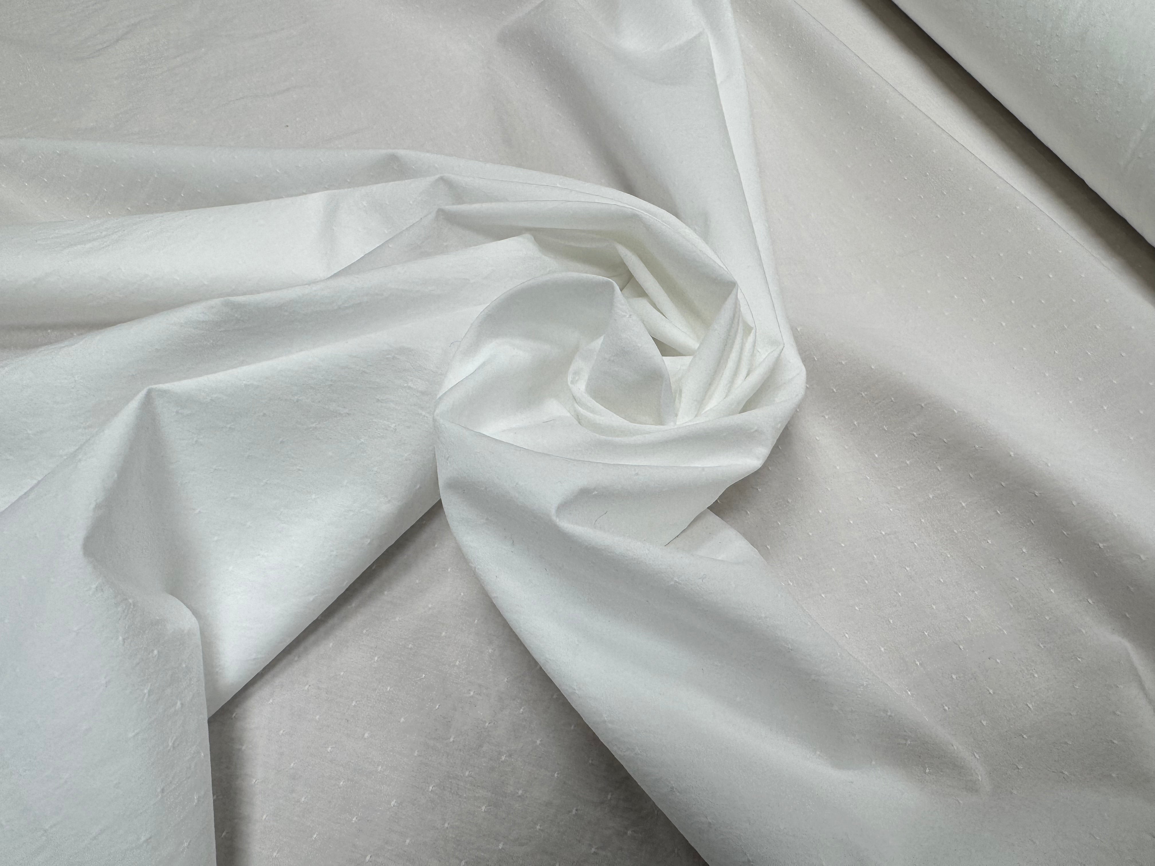 POPELINE DE COTON MICROSTONE CRAQUANT PLUMETIS BLANC - My Little Coupon