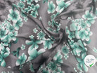 VISCOSE À MOTIFS ROSES ET PISSENLITS SUR FOND GRIS DE COULEURS GRIS ET VERT - My Little Coupon